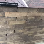 Showroomwand Nostalgie wasserstrich getrommeld UWF60 met zwart label, bruine en antraciet klinkers