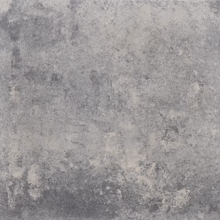 Close-up Soft Comfort Grezzo tegel met grijze structuur en lichte beige vlekken