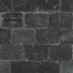 Detail van Tambour Antraciet 20x30x6 stenen met lichte krassen en afgeronde kanten