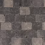 Close-up van donkergrijze getrommelde Tambour Smook stenen in halfsteens verband