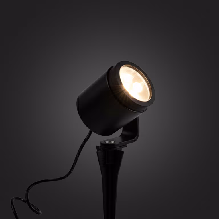 In Lite Big Scope Narrow grondspot met warm licht op donkere achtergrond