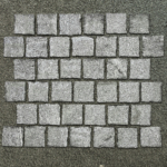 Natuursteen Kinderkoppen Juparana Piazzo Waterjet 10x10x8 cm bestrating