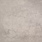 Detail van gemêleerde beige betontegel Trippel T Beige Nuance met lichte vlekken