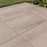 Close-up van Season Claude 60x60x4 Sand tegels met smalle voegen langs gazon