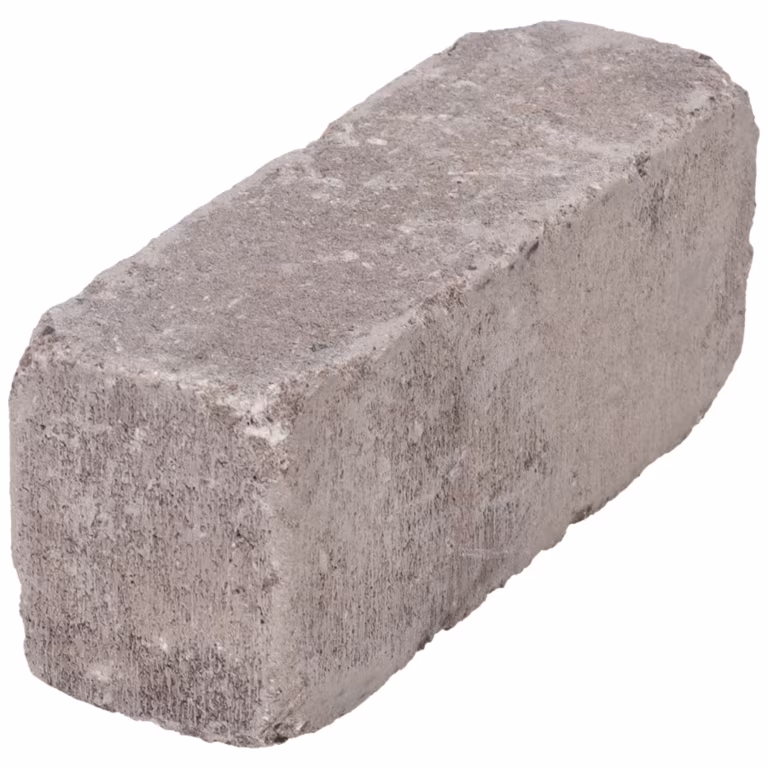 Losse WG Stone Trommelsteen Taupe 21x7x8 schuin van boven met getrommelde randen